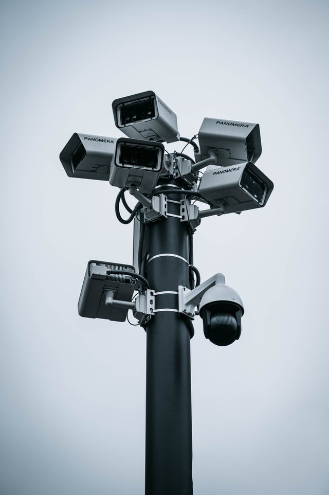 CCTV technician installing a security camera